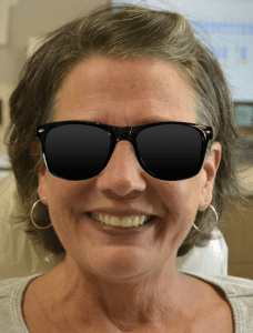 Smiling woman during dental restoration