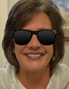 Smiling woman after dental restoration